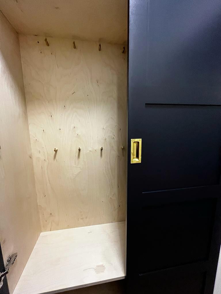 Wardrobe doors closed showing painted finish, Greenwich SE10