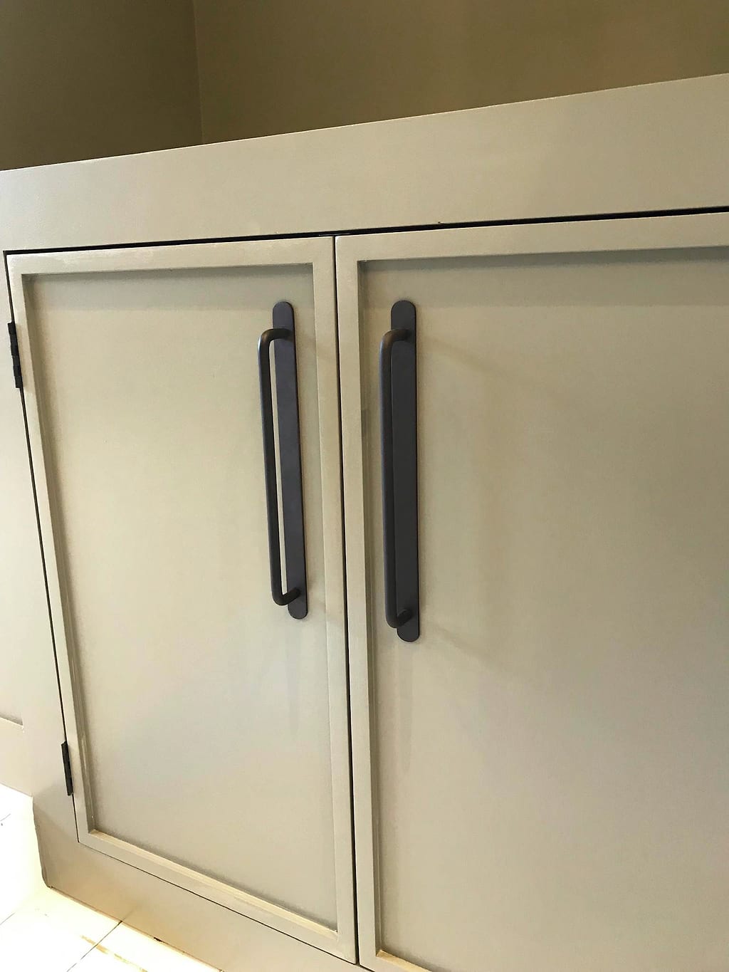 Detail of door alignment between wardrobe and under-stairs sections, South Woodford E18